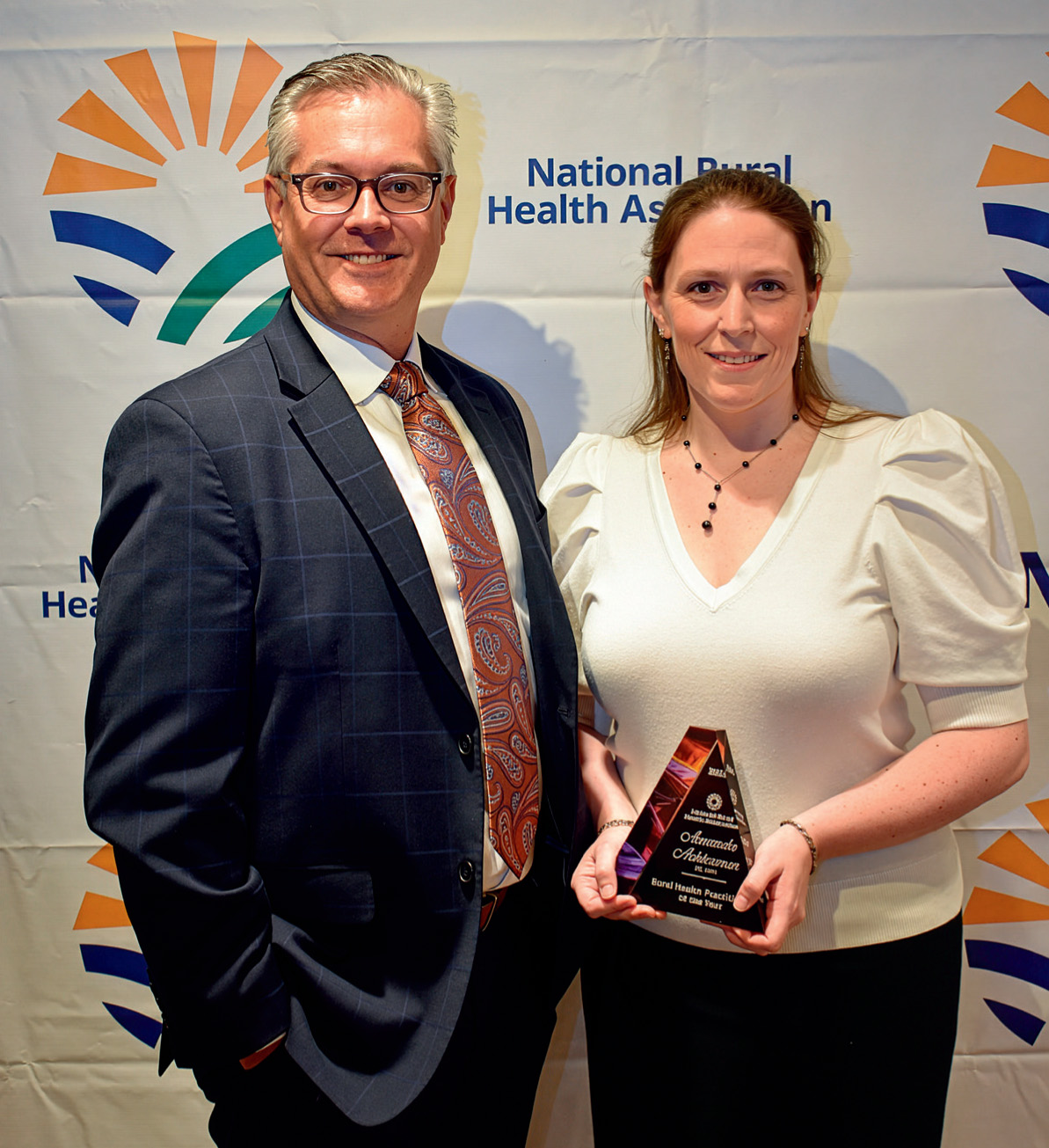 NRHA CEO Alan Morgan presents award to Amanda Achterman