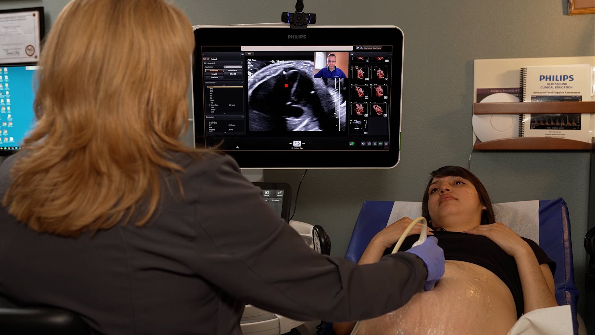 Woman receiving ultrasound from technician